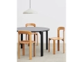 Rey Table vulcano laminate deep black wb lacquer beech_Rey Chair golden wb lacquer beech_Pao Steel Pendant 230 cream white.jpg