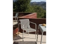 Palissade Dining Armchair sky grey_Palissade Table sky grey_Rainbow Plate warm yellow.jpg