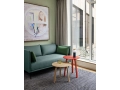 Zoku Hotel 2021_Bella Coffee Table wb lacquer oak_PC Portable ocean green_Silhouette 2 Seater Surface by HAY 950 black base.jpg