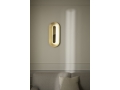 nuura-rick-tegelaar-sasi-large-brass-wall-lamp-closeup.jpg