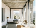Theia-in-a-concrete-house-1465x1200.jpg