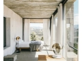 Theia-in-a-concrete-house-1465x1200.jpg