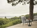 Settle-sofa-2-seater-lounge-chair-ribbed-weave-2-dark-green-linear-steel-coffee-table-dark-green-muuto-org.jpg