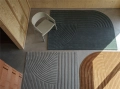 relevo-rug-dark-green-sage-green-burnt-orange-170x240-cover-lounge-dark-beige-muuto-org.jpg